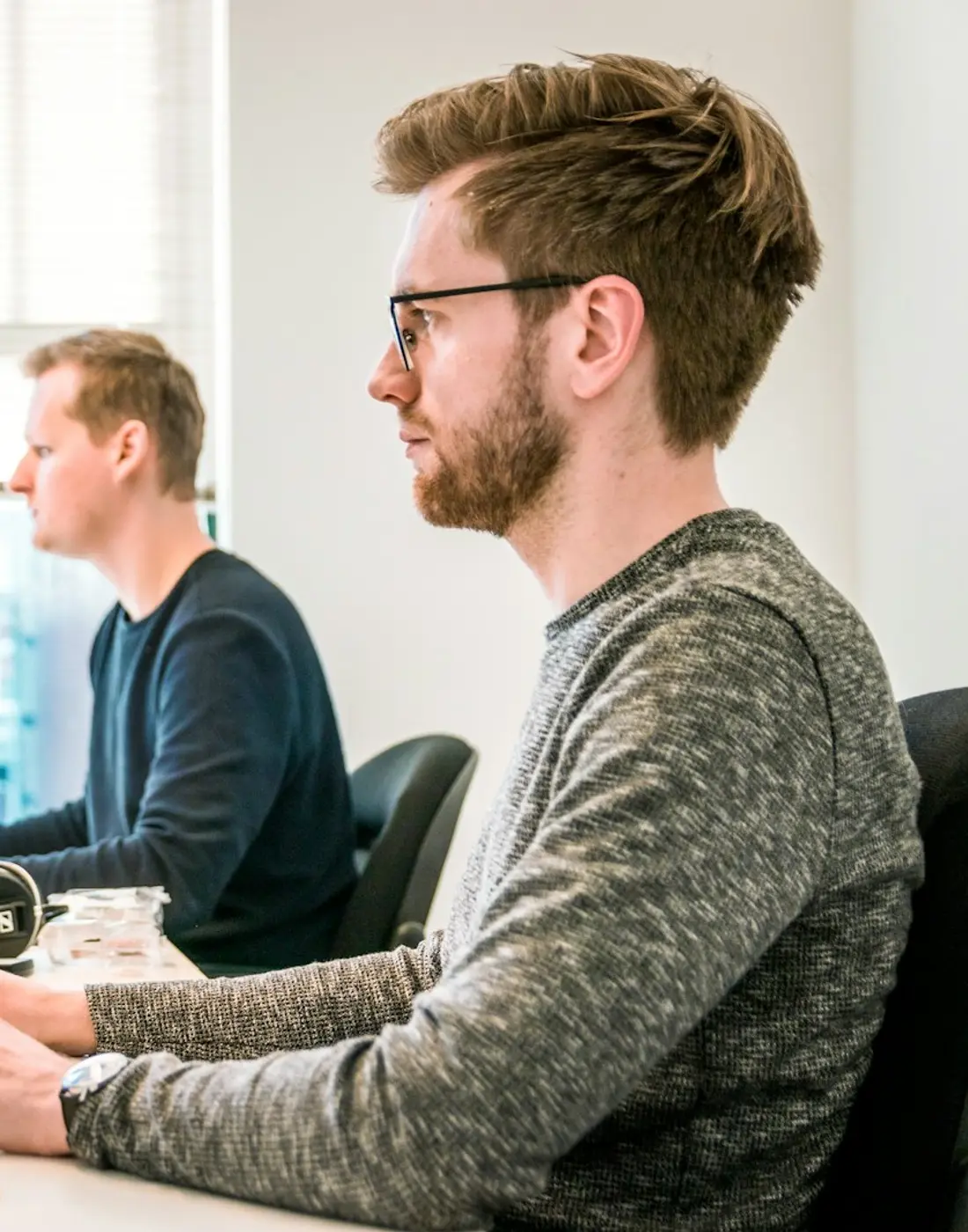 A developer building a website in a bright studio